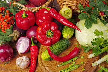 A variety of delicious vegetables on the kitchen board. Copy space. 