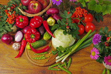 A variety of delicious vegetables on the kitchen board. Copy space. 