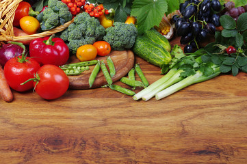 A variety of delicious vegetables on the kitchen board. Copy space. 