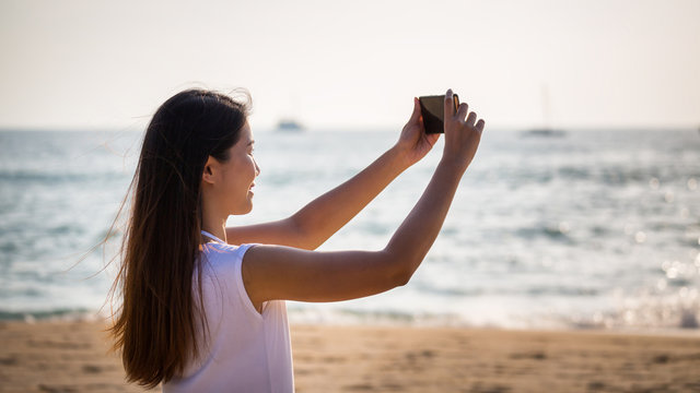 Woman selfie on beach