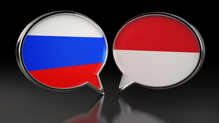 Obraz premium Russia and Monaco flags with Speech Bubbles. 3D illustration