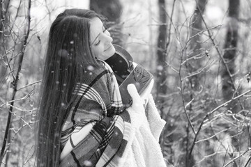 A girl in a winter cloudy day