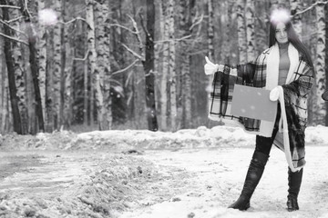 A girl in a winter cloudy day