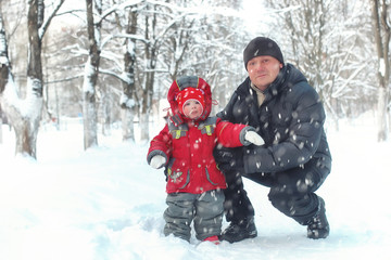 Young family in winter park