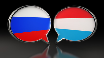Russia and Luxembourg flags with Speech Bubbles. 3D illustration