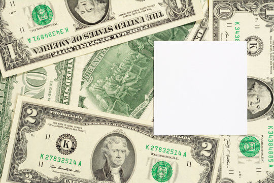 Dollars banknotes background with copy space on white. High resolution photo close-up macro.