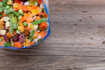 Frozen vegetables in a plastic bag. Healthy food storage concept.