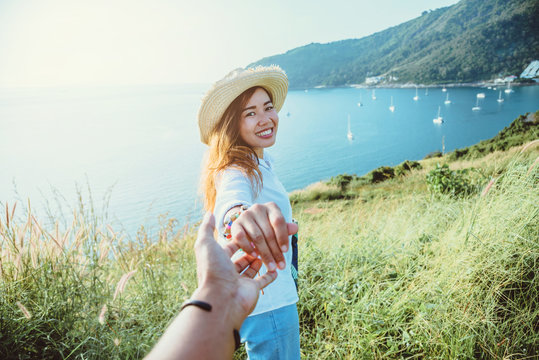 Asian lover couple woman and man travel nature. Travel relax. sea In the summer. Promthep Cape, Phuket Thailand.