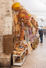 View of a narrow street in  Bari, Puglia, Italy, Bari vecchia, traditional open market shops with...