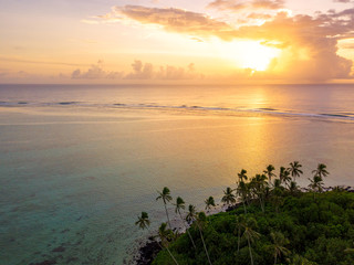 An aerial view of Muri Lagoon at sunrise in Rarotonga in the Cook Islands