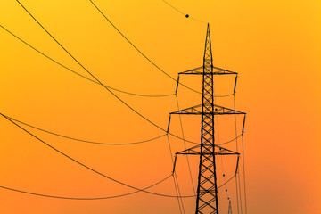 Energy pylons at sunset