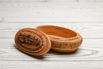 handmade birch bark box on a light background