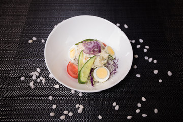 Close up view of plate with japanese food inside. Japan traditional food on wooden table.
