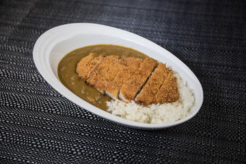 Close up view of plate with japanese food inside. Japan traditional food on wooden table.