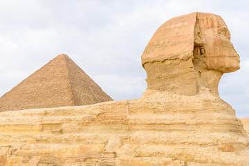 The great pyramid of Cheops and Sphinx in Giza plateau. Cairo, Egypt
