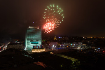 Administration building of the Primolr region and fireworks in honor of the Victory Day celebration...