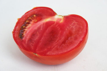 Half of ripe tomato. Candid.