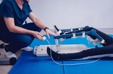 Patient on CPM (continuous passive range of motion) machines. Device to provide anatomically correct motion to both the ankle and subtalar joints.