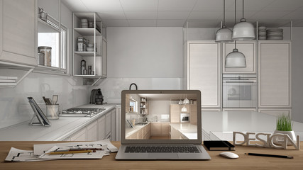 Architect designer desktop concept, laptop on wooden work desk with screen showing interior design project, blueprint draft background, modern white kitchen with wooden details