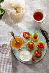 Cheese pancakes and tea top view