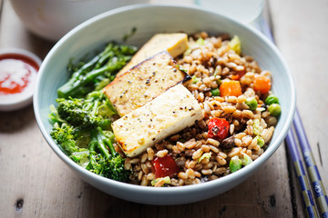 Spelt, broccoli, savoy cabbage with chargrilled tofu with sriracha 