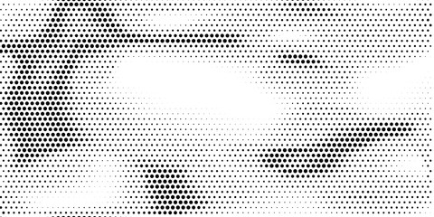 Fototapeta premium Grange halftone texture of black and white dots.