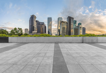 Panoramic skyline and buildings with empty square floor.