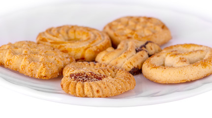 Obraz na płótnie Canvas Homemade peanut butter cookies on white plate