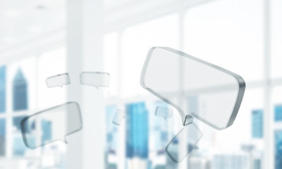 Concept of communication by glass empty chat icon on office back