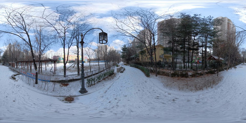 BUCHEON, SOUTH KOREA - December 13, 2018:  Panorama 360 degrees angle view of snow-covered park on...