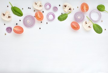 Vegetarian, vegan food concept, onions, tomato, mushroom, spinach, food pattern background with copy space.