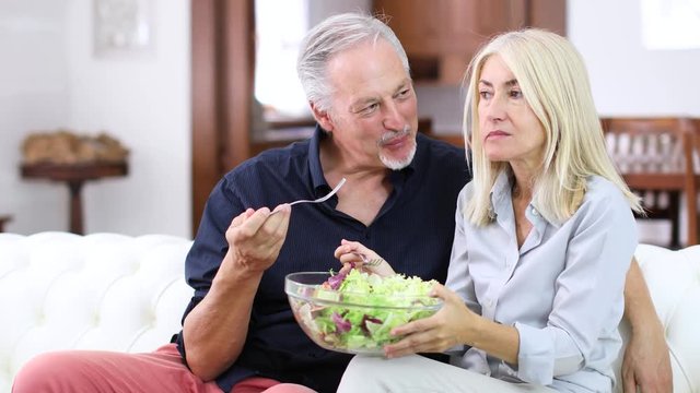 Mature couple try to eat healthy but turns out to have a bad taste