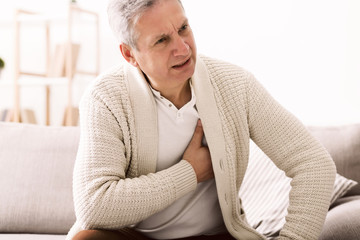Mature man with chest pain, suffering from heart attack