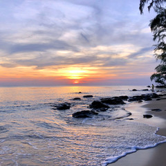 beautiful red-orange sunset on the beach of mango bay on Phu Quoc island in Vietnam