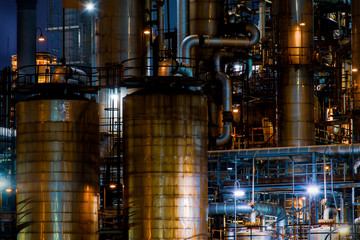 oil and gas refinery at night