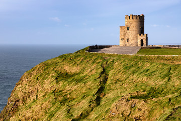 Fototapeta na wymiar Castle tower over Coffs of Moher