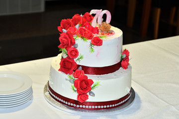 Obraz na płótnie Canvas sweet fruit cake for the 70th birthday