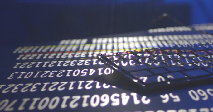 Hacker code is running on the keyboard