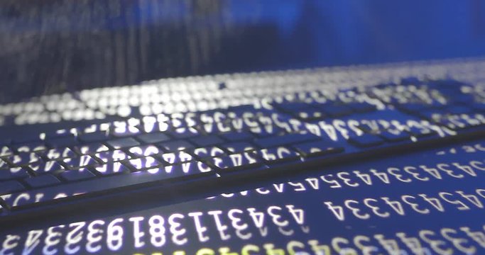 Hacker code is running on the keyboard