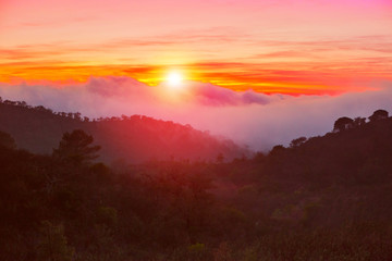 Picturesque Sunset Over Misty Landscape