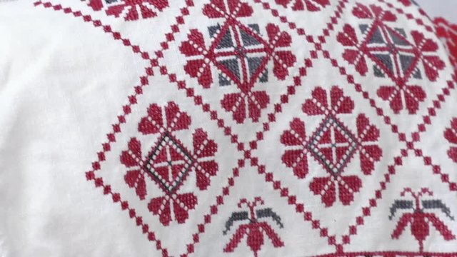 Antique towel in red and black colors. Traditional red and black cross-stitch. Belarusian folk embroidery, three colors - white, red and black