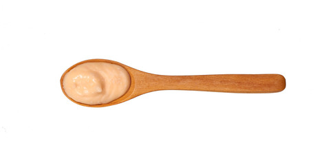 Shrimp sauce in small wooden spoon isolated on white background,top view
