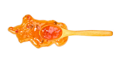 Sweet chili sauce in small wooden spoon isolated on white background,top view
