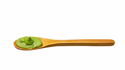 Wasabi sauce in wooden  spoon isolated on white background,