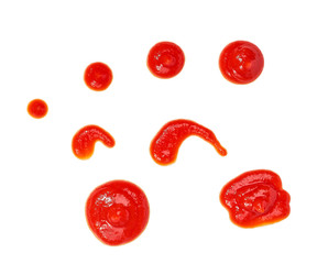 Fototapeta premium Puddle of tomato ketchup isolated on white background,top view.