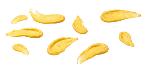 Splashes and stains mustard sauce  isolated on white background.