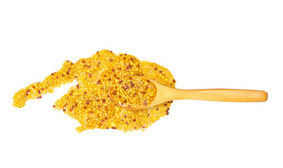 Mustard sauce in small wooden spoon isolated on white background,top view