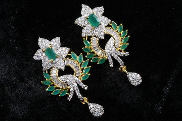 Imitation jewelry - Modern fancy earrings closeup macro image for woman fashion  