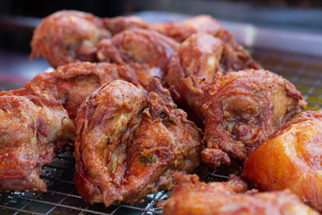 Fried chicken eat with sticky rice, famous street food in Thailand