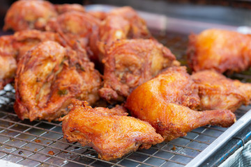 Fried chicken eat with sticky rice, famous street food in Thailand